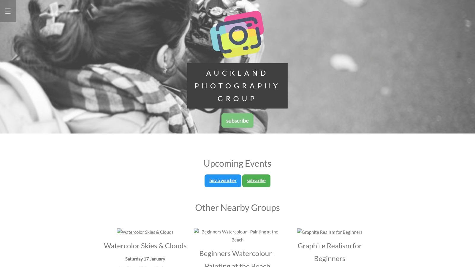 Auckland Photography Group website showcasing an event with a woman holding a camera in a natural setting.