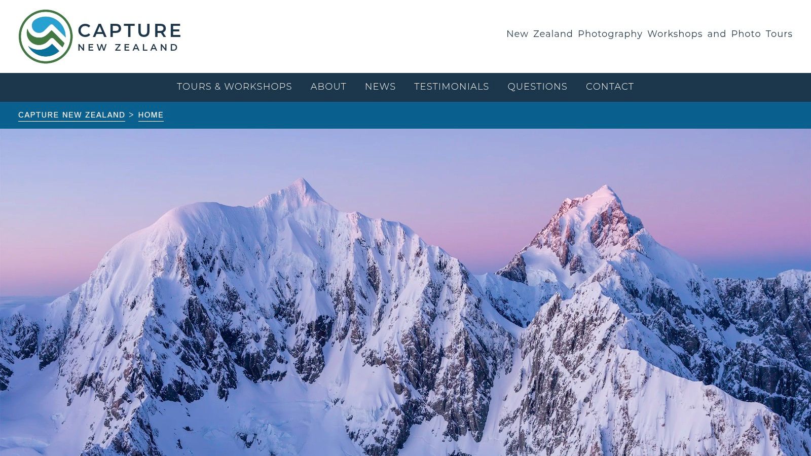 Capture New Zealand – Photography Tours & Workshops website showcasing snow-capped mountains.